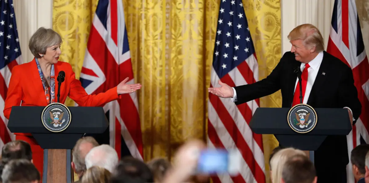ترامب وماي يتفقان على ضرورة قطع روسيا علاقتها بالأسد