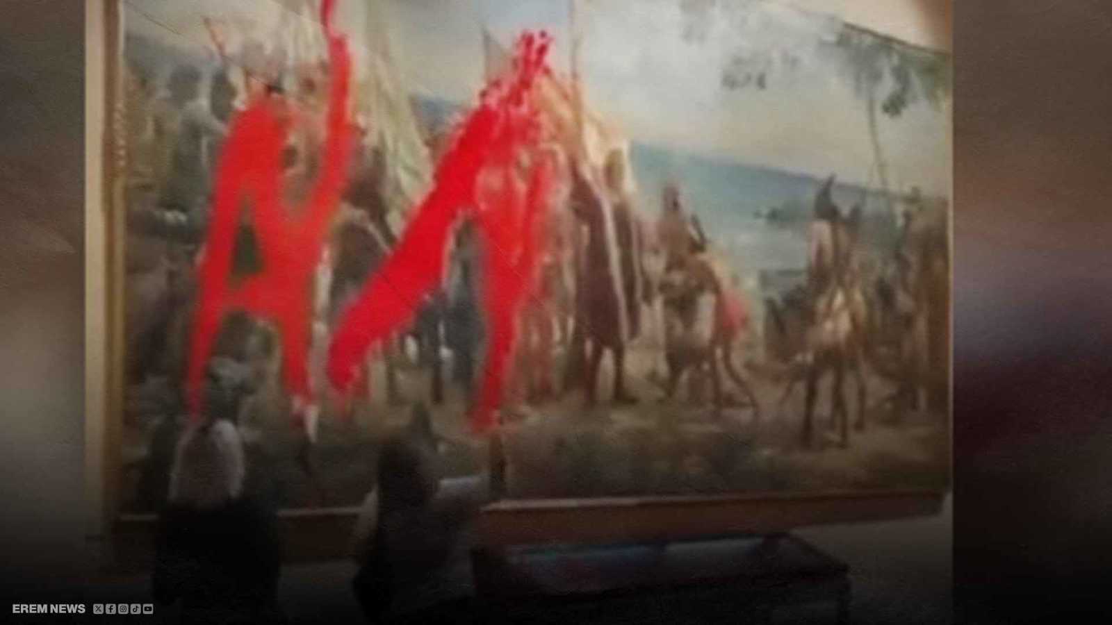 طلاء أحمر على لوحة كولومبوس يثير جدلاً في مدريد ويشعل الإنترنت (فيديو إرم)