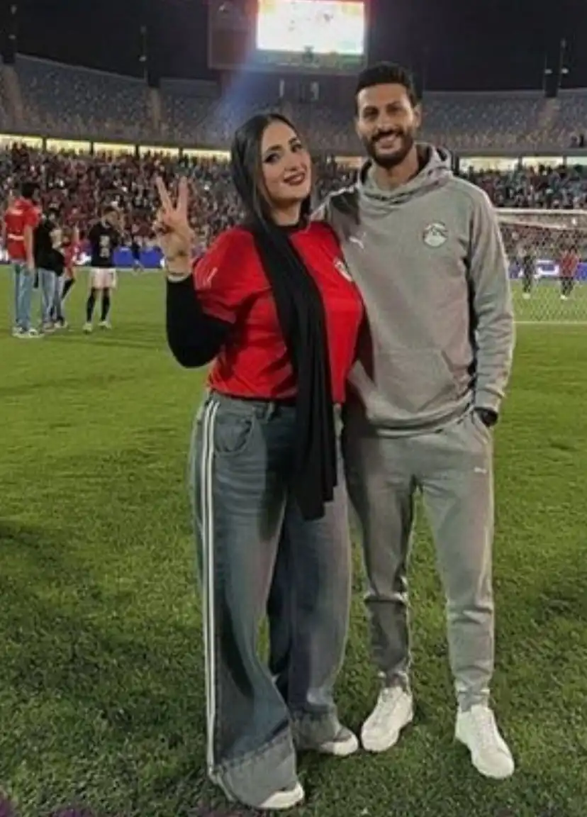 محمد الشناوي ورنا محمد بعد لقاء مصر وغينيا بيساو