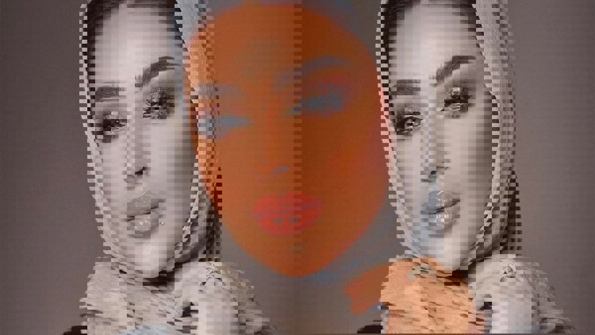 أمل الأنصاري تنفي أنباء اعتزال شقيقتها فاطمة