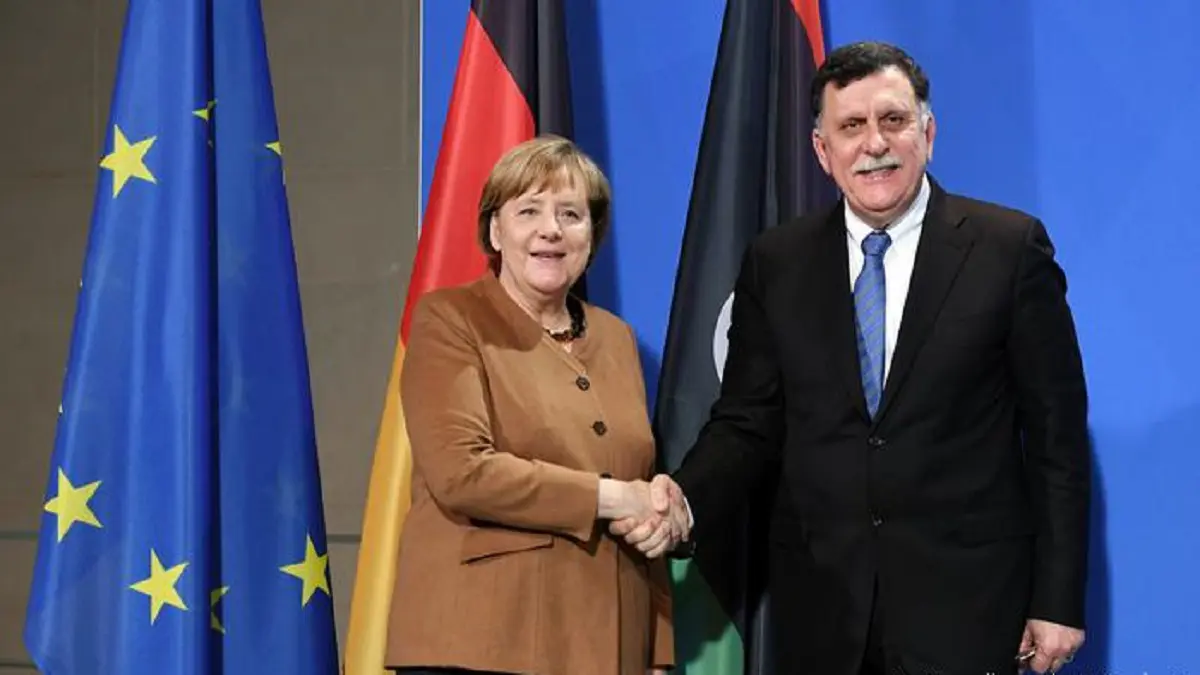 ميركل تحث فائز السراج على توقيع اتفاق وقف إطلاق النار