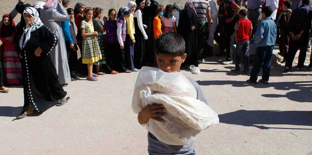 رفع الدعم عن الخبز يصدم السوريين والحكومة تعد ببطاقات تموينية الكترونية