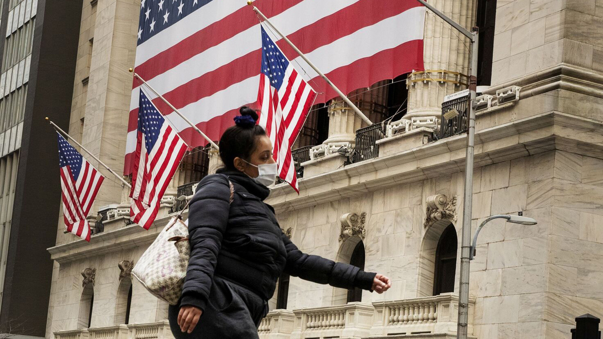 وول ستريت تغلق منخفضة بسبب انتخابات جورجيا وقفزة بإصابات كورونا