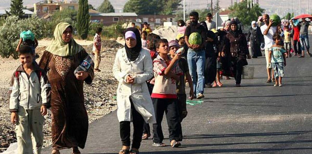 ولايات أمريكية ترفض اللاجئين السوريين بعد هجوم باريس