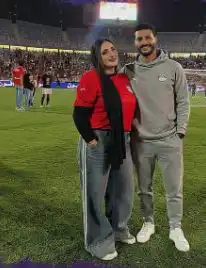 محمد الشناوي ورنا محمد بعد لقاء مصر وغينيا بيساو