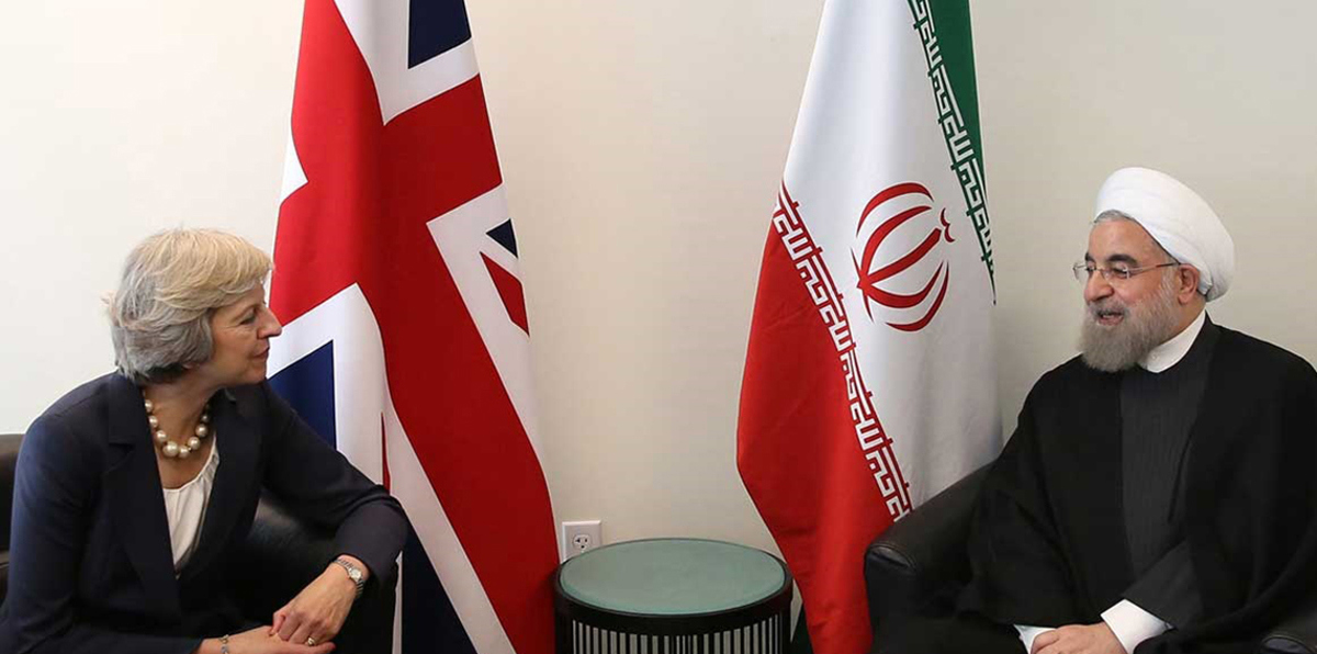 رئيسة وزراء بريطانيا تطالب روحاني بالإفراج عن موظفة إغاثة