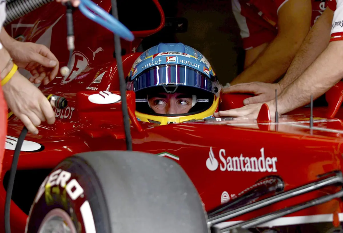 ألونسو يسعى للاقتراب من فيتل من بوابة وطنه