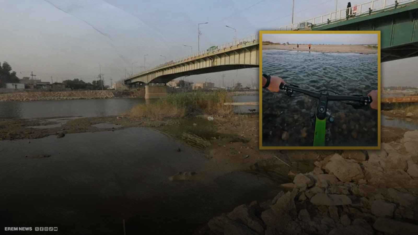 مشهد مُبكٍ.. شاب عراقي يسير على نهر دجلة بـ"الدراجة" (فيديو إرم)