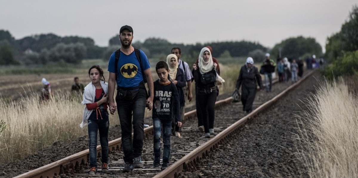 اللاجئون السوريون يعيدون الحياة لمدينة إيطالية هجرها أغلب سكانها (صور)