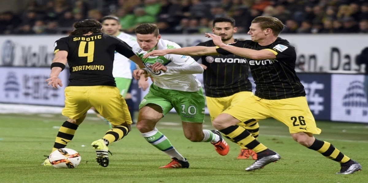 دورتموند يحقق فوزًا صعبًا على فولفسبورج ويواصل مطاردة بايرن