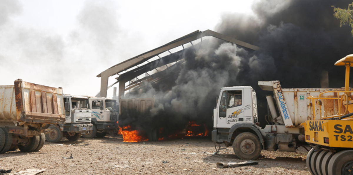 مقتل 4 مدنيين بانفجار مستودع أسلحة شرق بغداد (صور وفيديو)