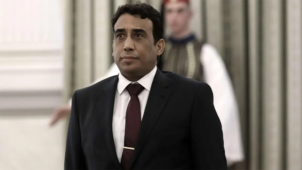 المنفي يكشف عن خطته لنزع سلاح الميليشيات و "تفكيكها"