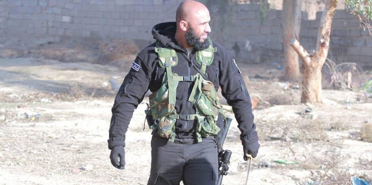 مجددًا.. القيادي بالحشد الشعبي "أبو عزرائيل"يمثل بجثة قتيل