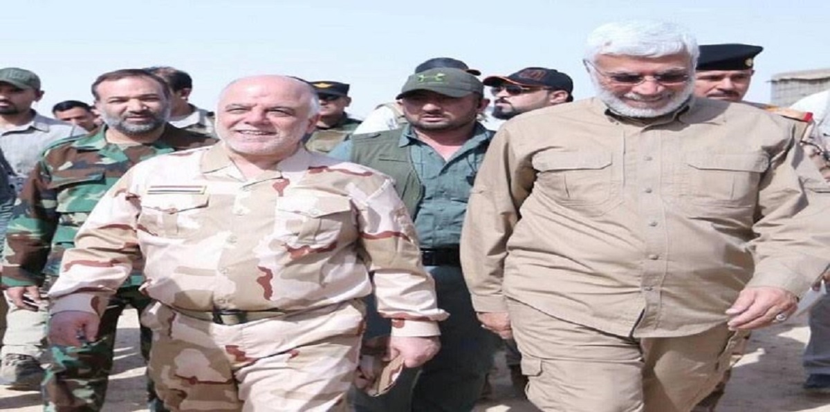 من إيران.. قائد بالحشد الشعبي يهدد العبادي