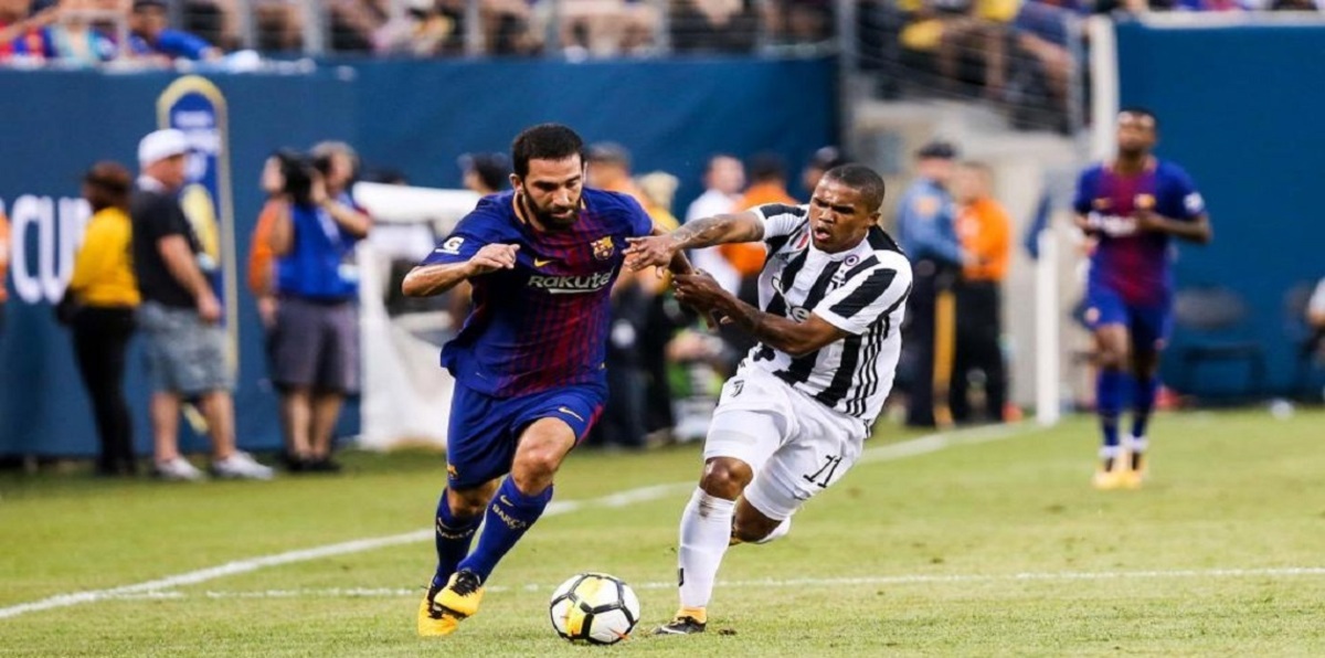 توران يظهر في لندن "متخفيًا" للتفاوض مع آرسنال (صور)