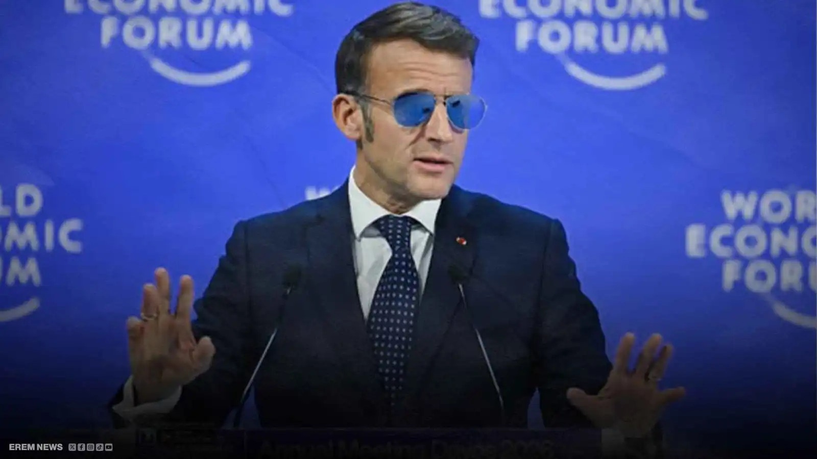 بنظارات شمسية زرقاء.. ماكرون يثير فضول العالم أثناء خطابه في دافوس