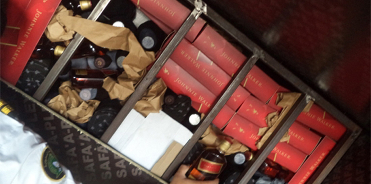 سعودية تحاول تهريب 1500 زجاجة خمر مع سائق أجنبي