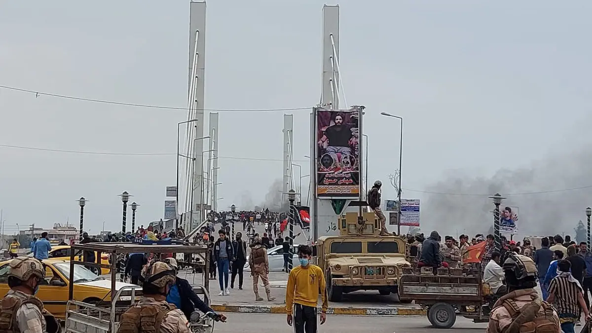 العراق.. جرحى جراء صدامات بين المتظاهرين وقوات الأمن في محافظة ذي قار (فيديوهات)