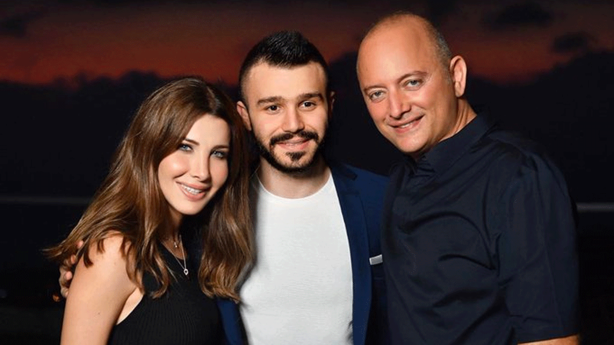 صحفي لبناني يكشف حقيقة الصورة التي تجمع نانسي عجرم وزوجها والقتيل