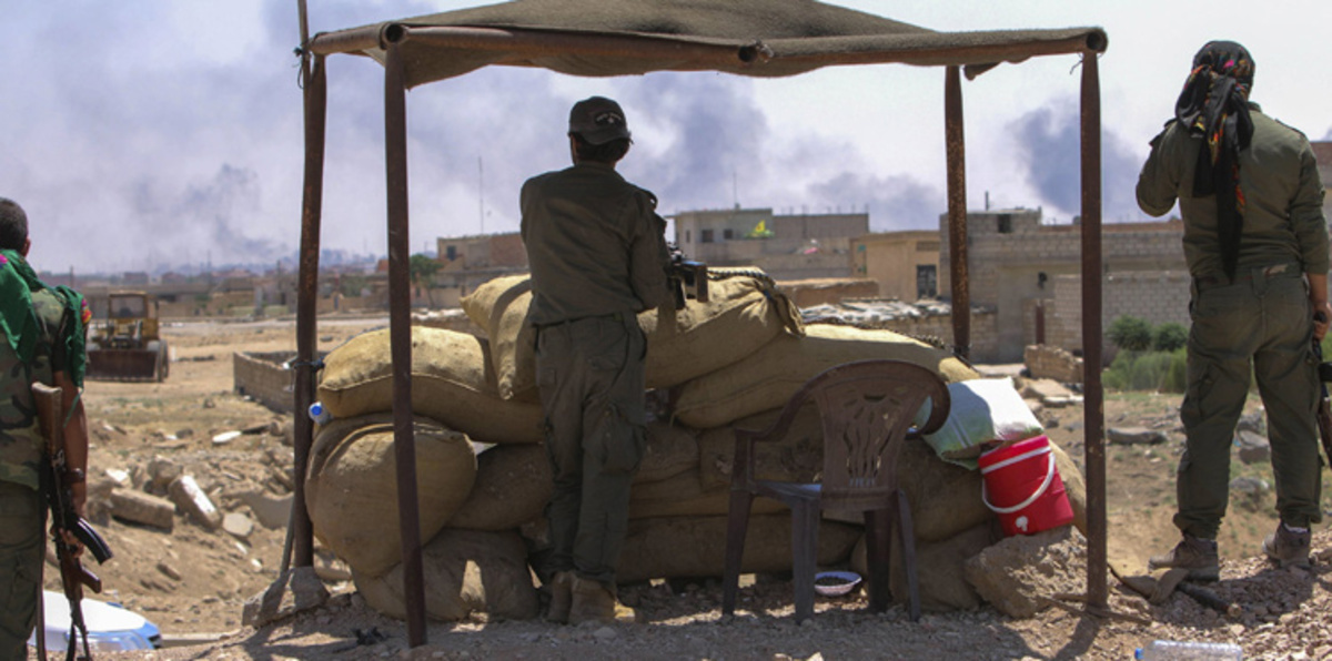 "وحدات حماية الشعب" الكردية تحاصر داعش بالحسكة السورية