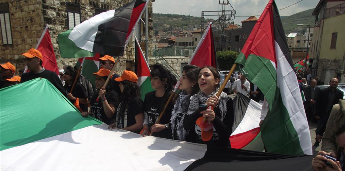 نتنياهو ووزراؤه يستغلون رفع الأعلام الفلسطينية في تل أبيب لتبرير فرض "القومية اليهودية"