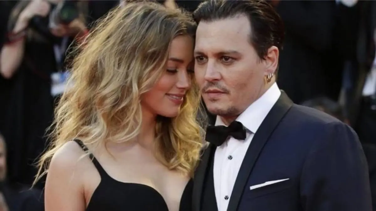 آمبر هيرد تسوي قضية التشهير مع جوني ديب