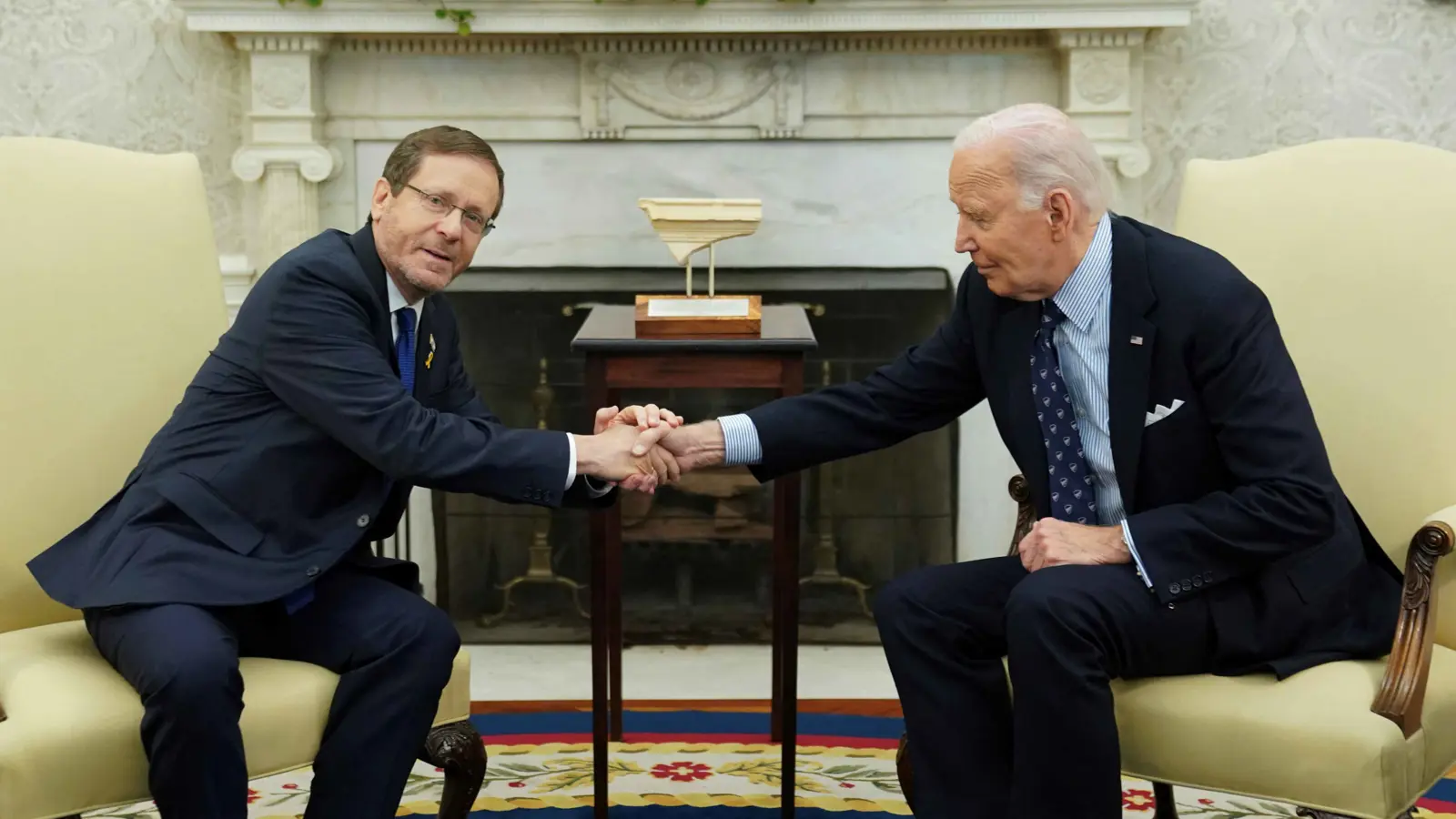 الرئيس الإسرائيلي لبايدن: طهران "إمبراطورية الشر"