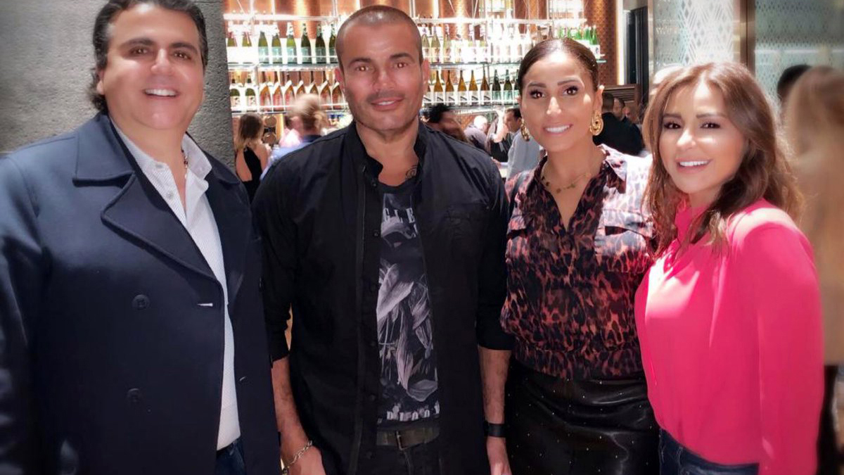 شاهد.. عمرو دياب ودينا الشربيني يظهران معا في إعلان شركة للاتصالات