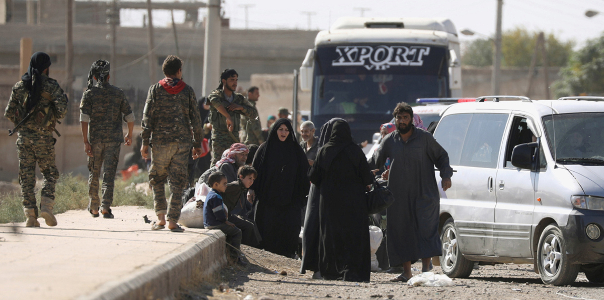 دمار الرقة يترك بصمته على وجوه النازحين العائدين بعد طرد داعش (صور)