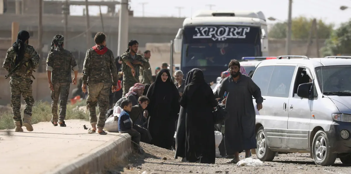 دمار الرقة يترك بصمته على وجوه النازحين العائدين بعد طرد داعش (صور)