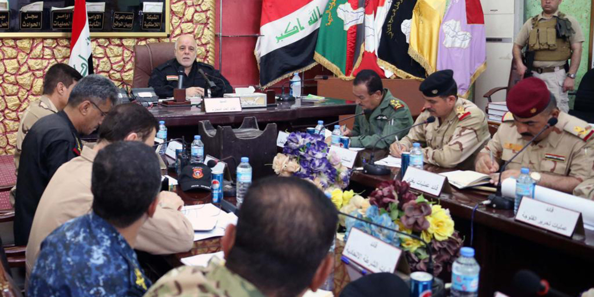 العبادي يتعهّد بردٍ حازم ضد متظاهرين هاجموا مقرّات حزبية