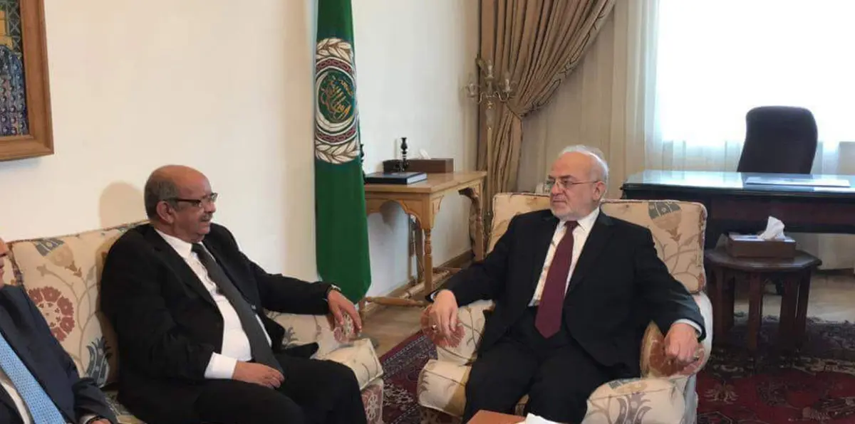 عقب أزمة هتافات "صدام حسين".. الجعفري ونظيره الجزائري يطويان الأزمة الدبلوماسية من القاهرة