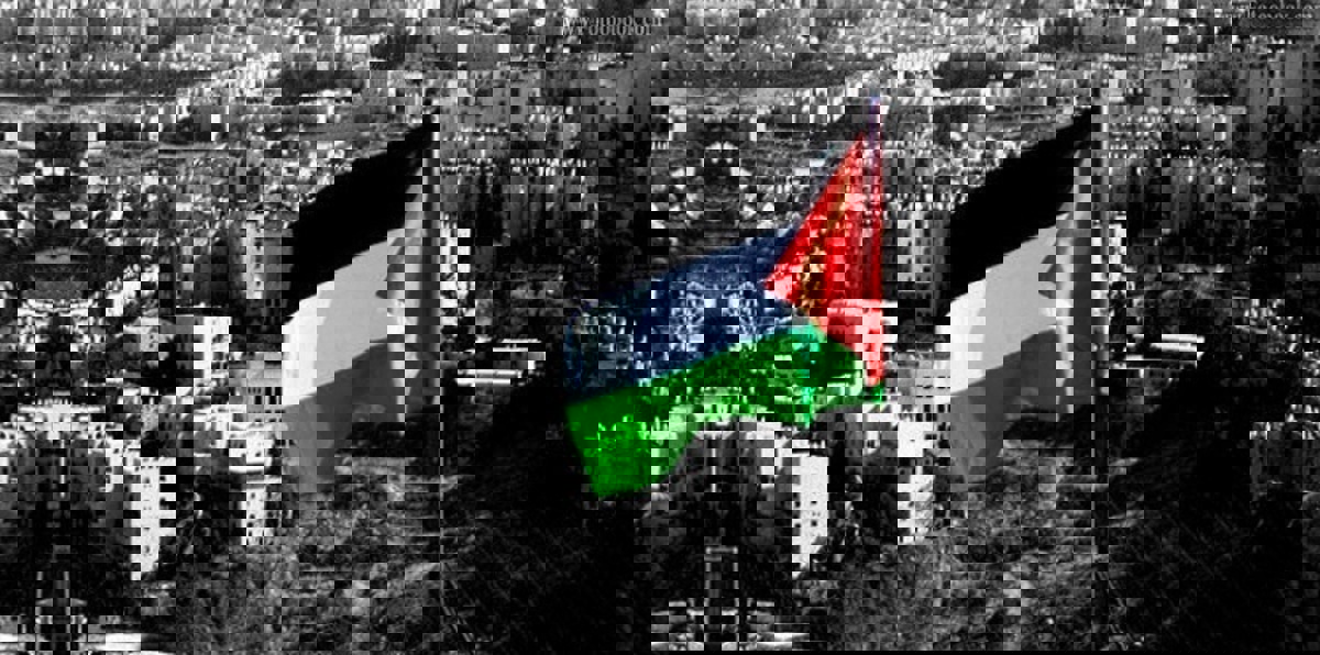 داعش يهدد بإعدام كل من يرفع العلم الفلسطيني في مخيم اليرموك