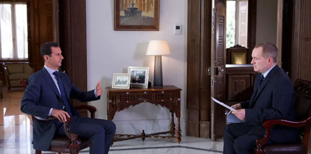 الأسد يتساءل في أحدث حواراته: ما هي البراميل المتفجرة؟