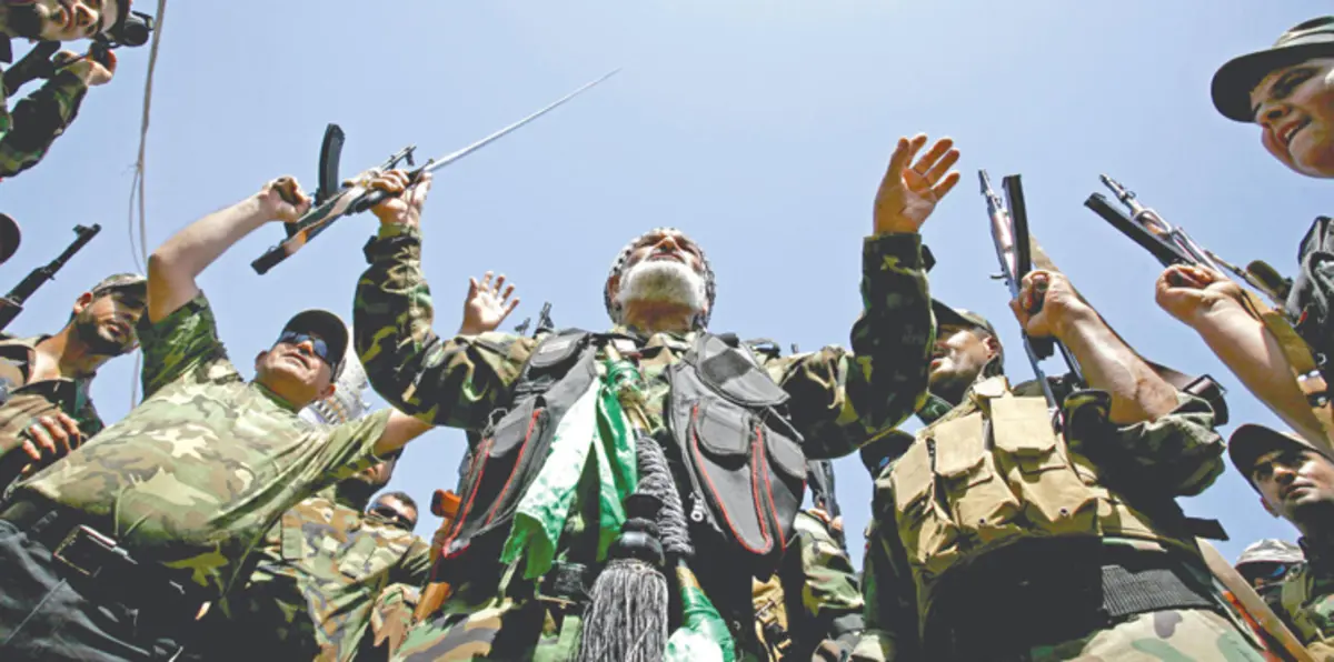 اتساع ظاهرة "أشقاء السلاح".. تنامي الفصائل المسلحة بالعراق مع تراجع "داعش" ينذر بالخطر