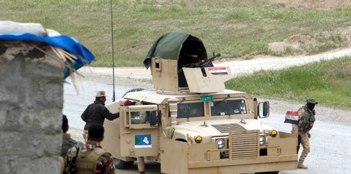 تقرير: الجيش العراقي يفر أمام داعش وأمريكا تدفع بمزيد من قواتها