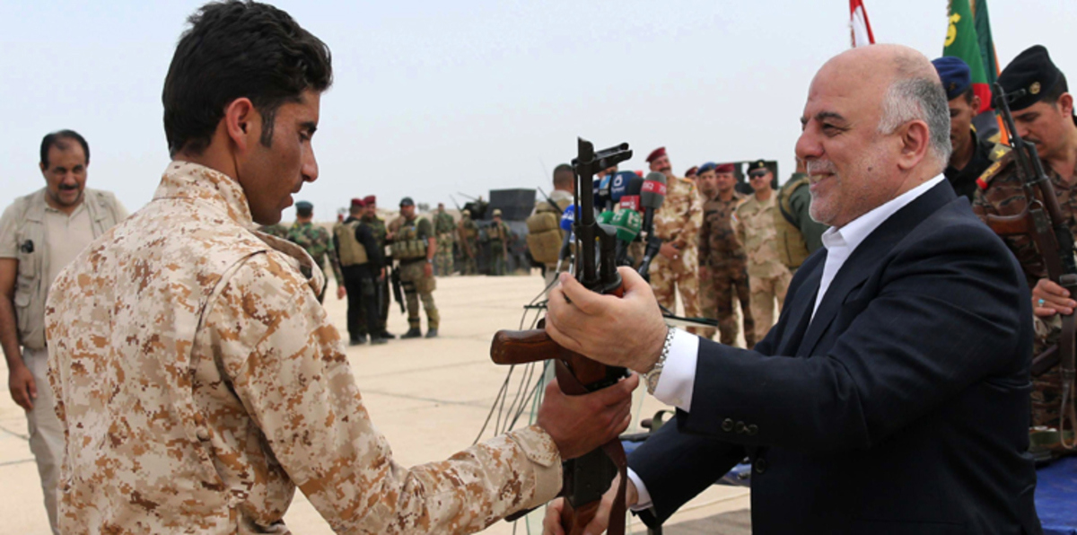 تقرير: العبادي أقرّ بعجزه عن مساءلة ميليشيات الحشد الشعبي