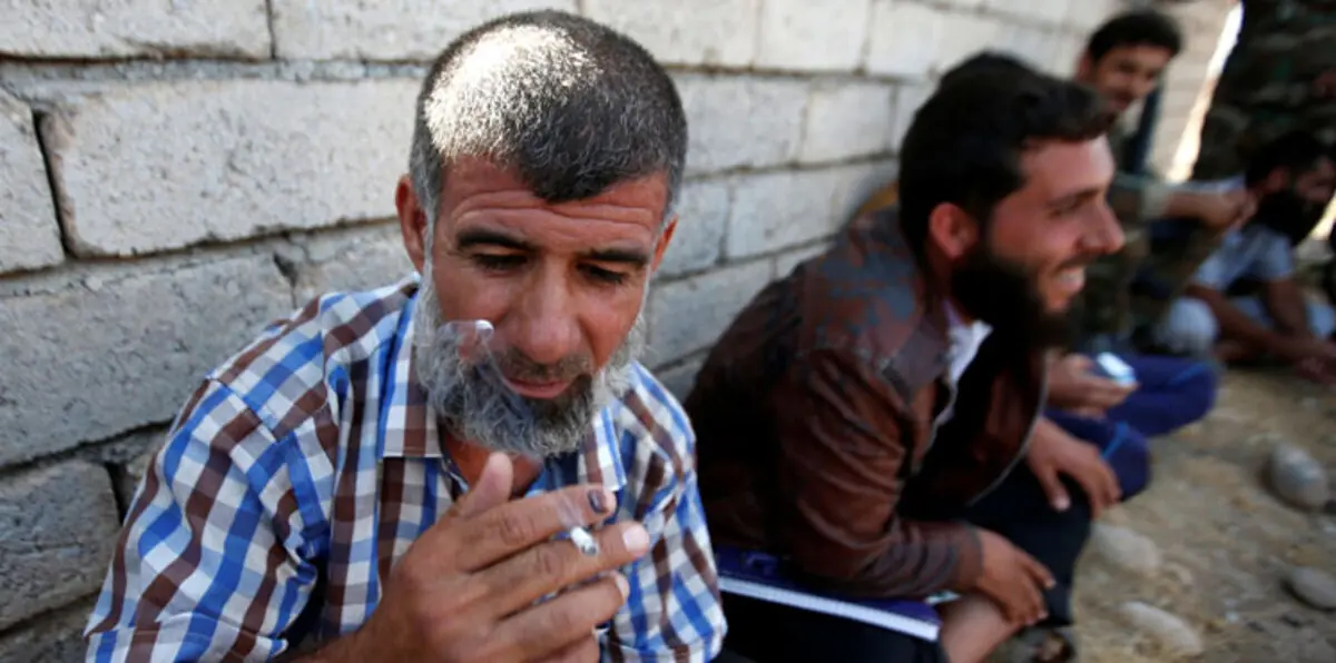 داعش يحتجز مئات العائلات في مدارس الموصل