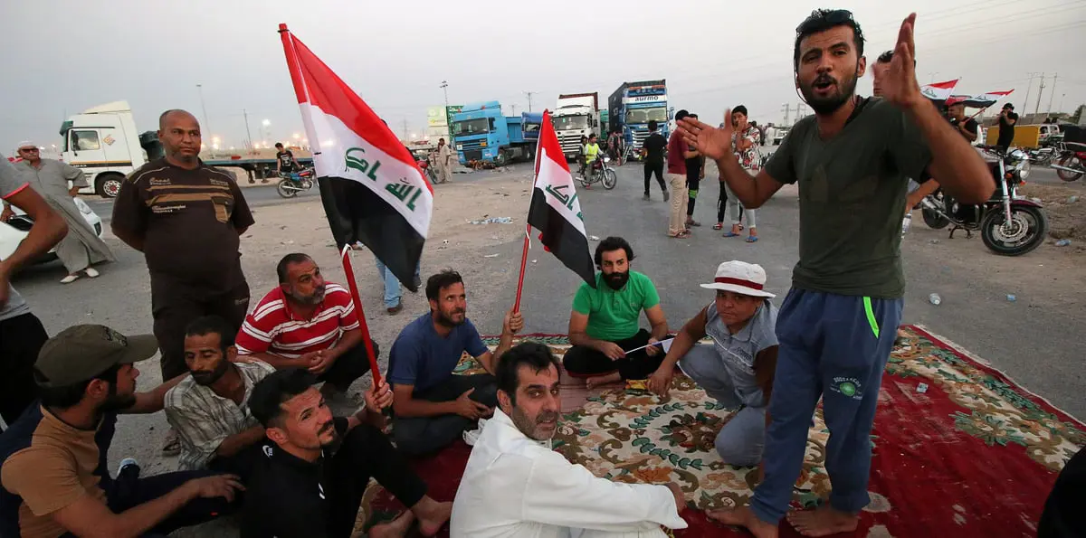 محتجون يتجمعون عند مدخل حقل السيبة للغاز بجنوب العراق