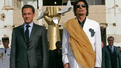 ساركوزي ومعمر القذافي