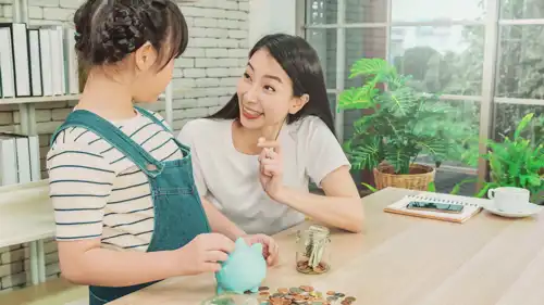 تعليم الطفل التعامل مع المال - تعبيرية
