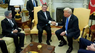 دونالد ترامب ورئيس الوزراء الياباني شيغيرو إيشيبا