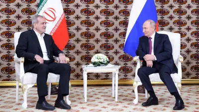 لقاء سابق بين بوتين وبزشكيان