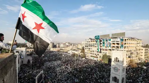 جانب من الاحتفالات السورية بذكرى سقوط النظام السابق