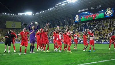 احتفال فريق القادسية بالفوز على النصر