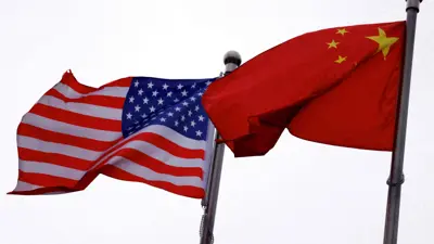 العلمان الأمريكي والصيني