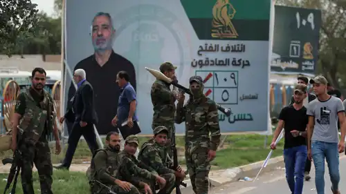 مقاتلون في الحشد الشعبي خلال انتخابات سابقة