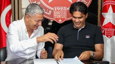 الأسعد الدريدي  (يمين) مع زبير بية 