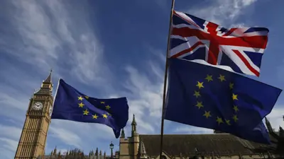 علما بريطانيا والاتحاد الأوروبي