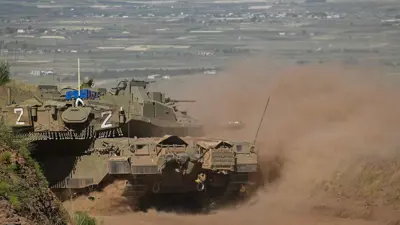 آليات عسكرية إسرائيلية في المنطقة العازلة